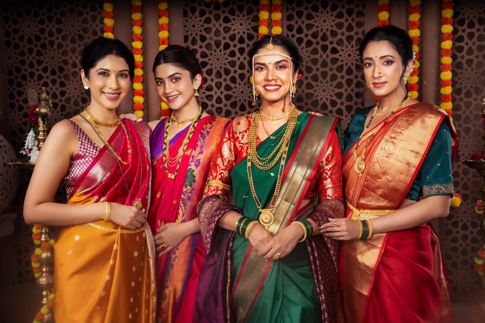 Maharashtrian bride wearing layered gold jewellery