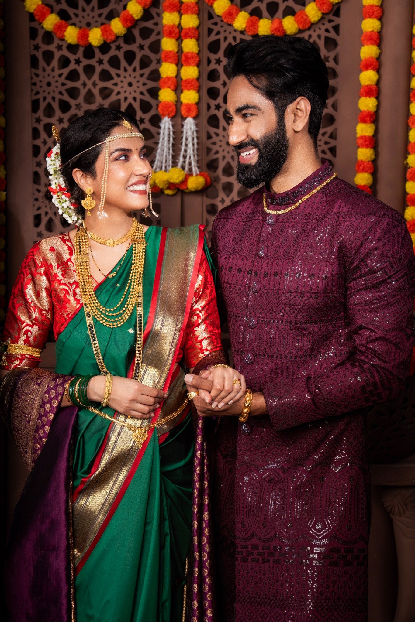 Maharashtrian woman wearing layered gold necklaces
